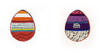 Adorno de huevo de Pascua con franjas de tonos anaranjados y violáceos